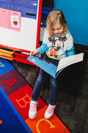 student reading in classroom